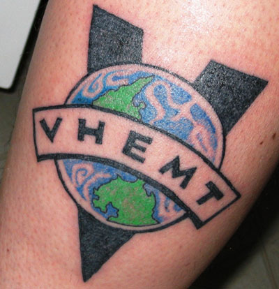 Paul's tattoo. Paul's lower leg holds the vision of greener Americas and 